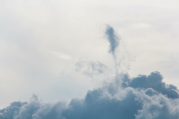Natural cloud formation of a cloud shaped like a rocket