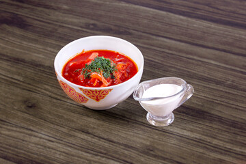 Traditional borsch delicious soup with white cream traditional Ukrain food cuisine