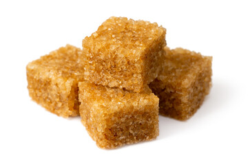 Brown sugar cubes isolated on white background