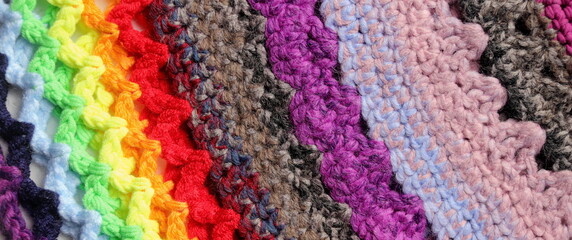 close up of colorful knitting needles