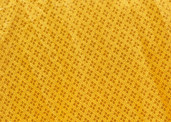 Close up texture of yellow robe