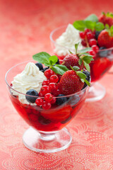 Fruit and Berries dessert with cream and jelly