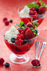 Fruit and Berries dessert with cream and jelly
