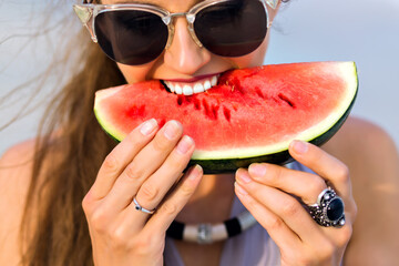 pretty woman eating watermelon