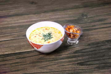 Finnish Soup with salmon, cream and crackers