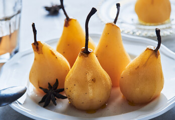 Poached pears with spices food dessert.