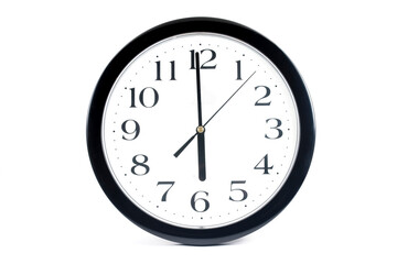 Black classic clock on isolated white background.