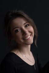 Ballet dancer on the black background