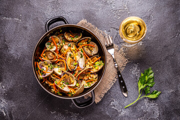 Shells vongole venus clams with vegetables and herbs