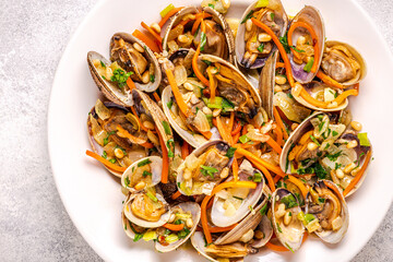 Shells vongole venus clams with vegetables and herbs