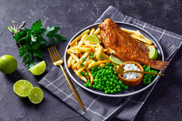 fried redfish with chips, green peas, tartar sauce