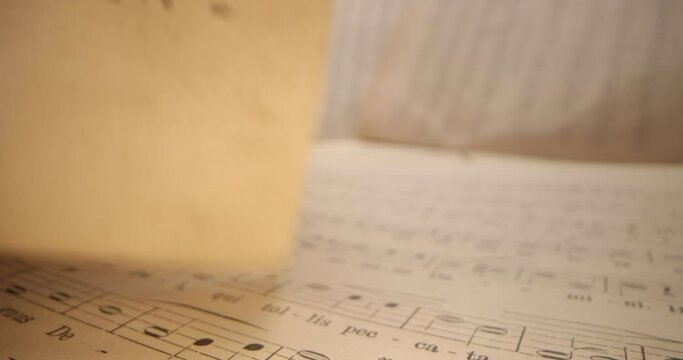 Musical notes, old musical note paper sheet. Super macro close up shoot fly over laowa 4k
