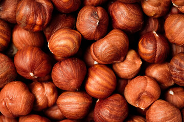 Peeled hazelnuts top view. Background 
