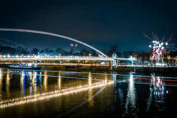 Maastricht celebrates the new year with a fireworks display near the Hoge Brug suspension bridge...