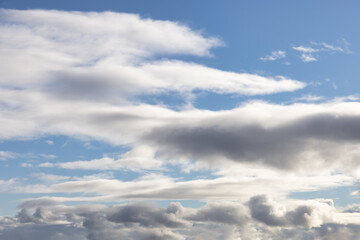 View of Cloudscape during a cloudy blue sky sunny day. Taken on the West Coast of British Columbia, Canada.