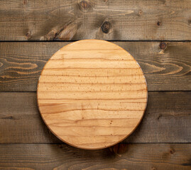 Pizza board on wooden table. Top view mock up