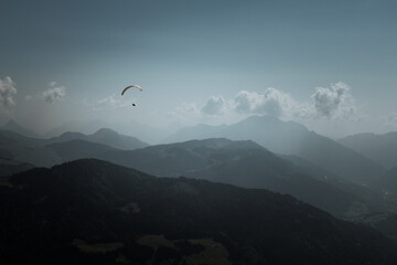 paragliding flight in the mountains. Le Grand-Bornand, France