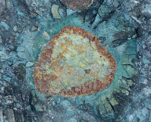 Concretions in volcanic rock with the presence of iron and copper.