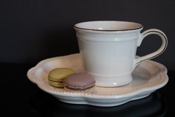 Macaron with a cup of hot coffee