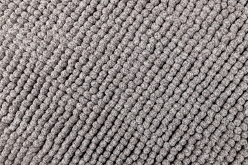 Gray chenille soft bath mat texture background. Bath Accessories. Top view.