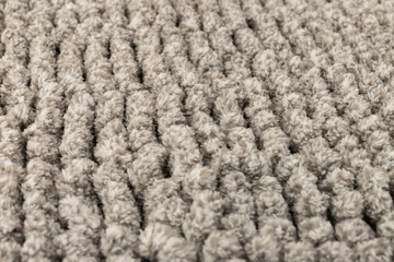 Gray chenille soft bath mat texture background. Bath Accessories. Top view.