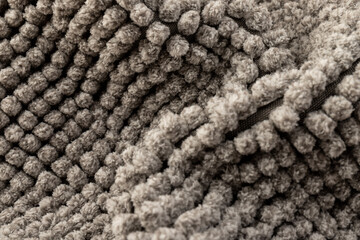 Gray chenille soft bath mat texture background. Bath Accessories. Top view.