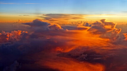 Scenic cloudscape view of a beautiful sunset seen at a high altitude 