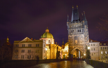 Fototapeta na wymiar Old bridge, night city landscape, medieval buildings