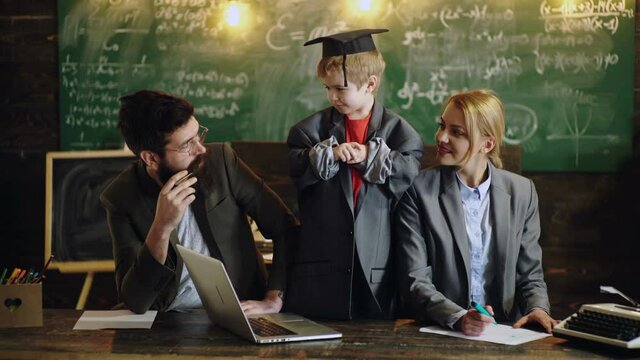 Father mother and son at school.