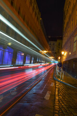 Fototapeta na wymiar Night streets with fast traffic