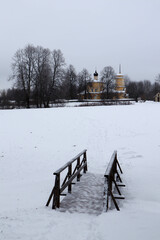 winter russian landscape with the snow covered church on background