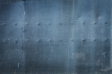 Metal texture with rivets from hull of old ship