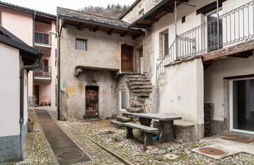 Naklejka premium Street in the small village Gorduno, district of Bellinzona, Canton of Ticino in Switzerland.