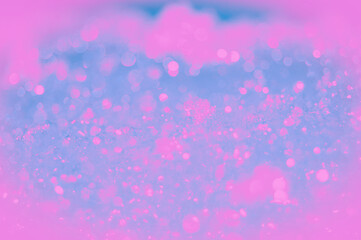 Background blue and pink with bokeh effect. Effect of soap bubbles.