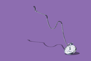 Fototapeta premium watch with chain, with a shadow on a very peri background, copy space