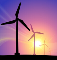 windmill turbine generators at sunset