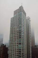 Fototapeta premium Chicago Skyline from Gold Coast with Skyscrapers Disappearing Into Fog