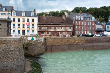 Houses on the quay of a port in Normandy, France