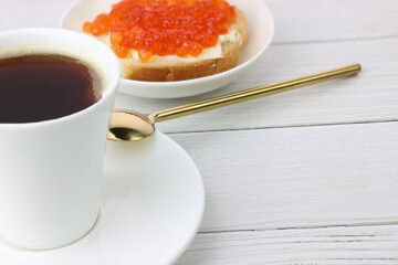 deluxe breakfast coffee and canapes with red caviar