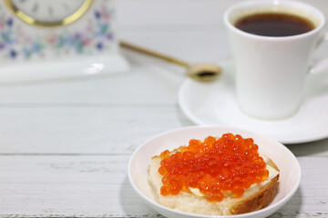 deluxe breakfast coffee and canapes with red caviar