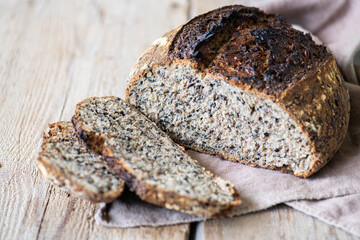 Homemade rye sourdough bread with black sesame. Healthy eating concept.