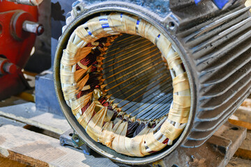 Repair and rewinding of the copper stator of the electric motor at the factory.