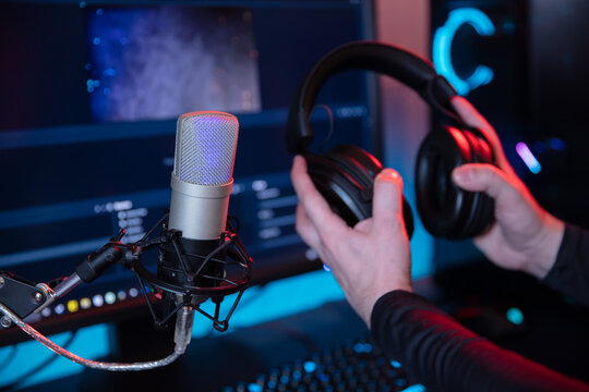 Professional microphone on the streaming or podcast room background
