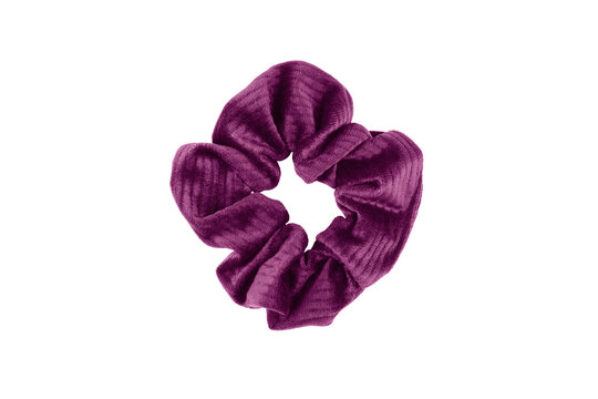 Purple velvet hair scrunchie isolated on white background. Trendy accessory.