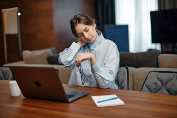 Neck Pain. Young tired woman massaging aching neck suffering cervical osteochondrosis ache from long working at laptop - obrazy, fototapety, plakaty