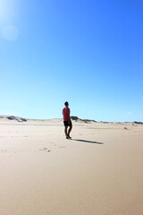 Man walking at the beach