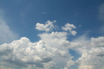 Tender blue sky with white clouds. For background design.