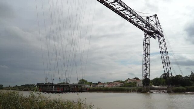ferry bridge with a gondola to cross the river charente. National monument. Rochefort sur mer. France