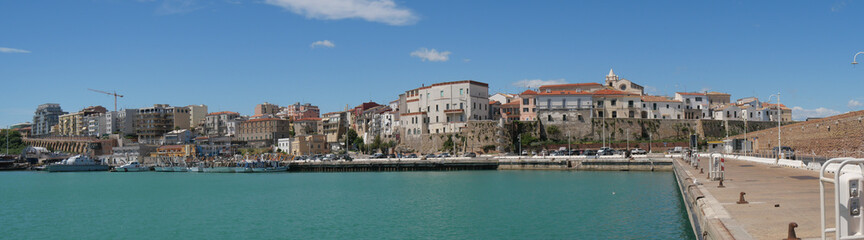 panorama from the port of Termoli on the old town enclosed by the walls of the Swabian Castle - obrazy, fototapety, plakaty