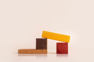 Wooden children's toys. Toys made of natural wood for educational games with children. Children's wooden constructor for an interesting educational game.